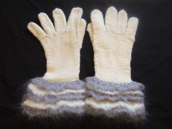 a pair of ruffled edged gloves