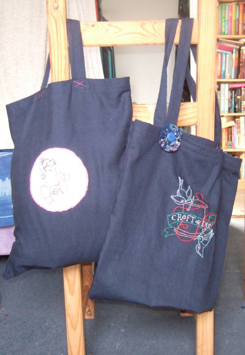 A pair of tote bags